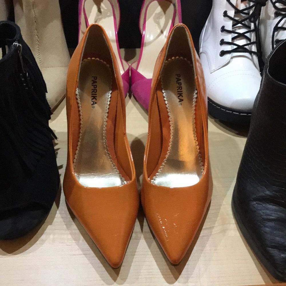 orange leather pointed toe heels